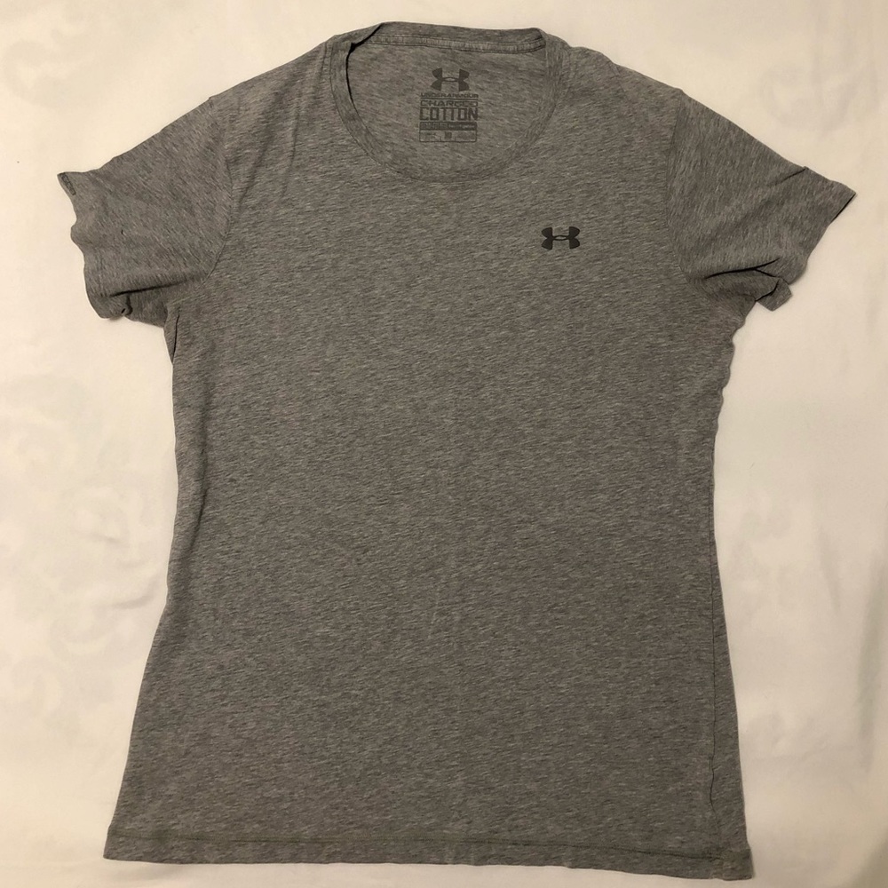 Woman’s Under Armor Charged Shirt Medium